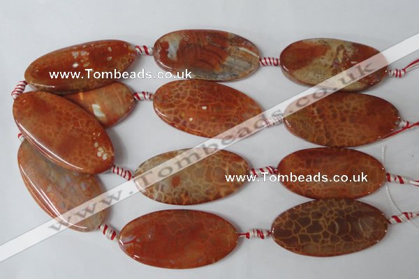 CAG1592 15.5 inches 25*50mm twisted oval fire crackle agate beads