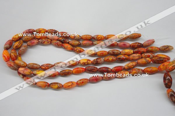 CDE510 15.5 inches 8*16mm rice dyed sea sediment jasper beads