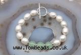 CFB992 Hand-knotted 9mm - 10mm rice white freshwater pearl & candy jade bracelet