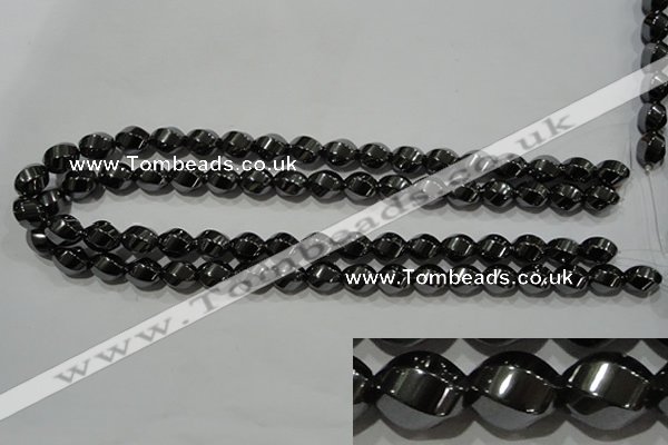 CHE166 15.5 inches 10*12mm twisted rice hematite beads