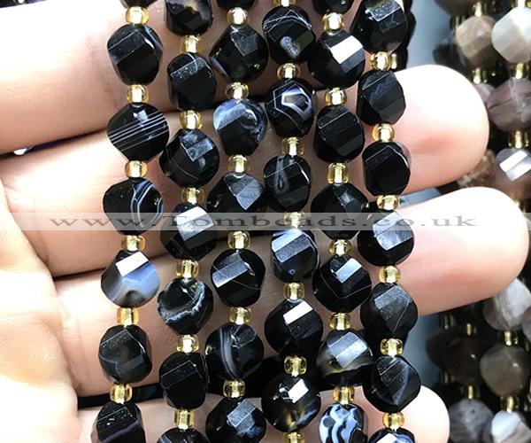 CTW583 8mm faceted & twisted S-shaped black banded agate beads