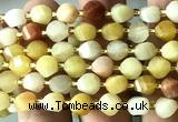 CTW597 8mm faceted & twisted S-shaped yellow aventurine jade beads