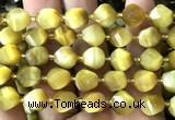 CTW663 10mm faceted & twisted S-shaped golden tiger eye beads